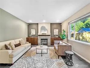 The living room is hardwired for surround sound speaker system