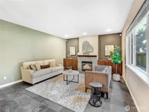 Cable conduit and built in cabinetry hide your cords while elegantly mirroring the kitchen