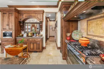 Kitchen path to office area and emergency egress door