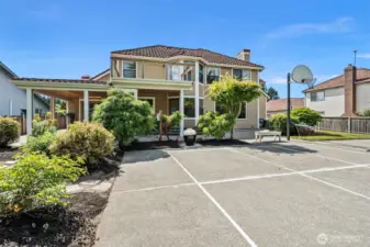 Backyard is huge with sport, entertaining, and mature landscaped grounds