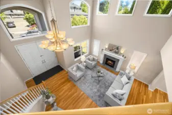 Bird's eye view of the entry & living areas from just outside the primary bedroom.