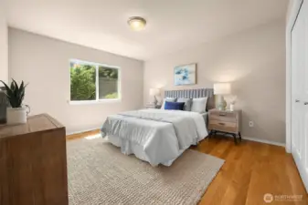 The second of 4 total bedrooms on the upper level also overlooks the back yard. Generous closet space in every bedroom!