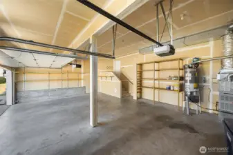 A rare 3-car garage and wide driveway offers space for everyone's vehicles and/or gear!