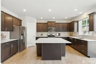 Counter space, cabinets, pantry, stainless steel appliances--this kitchen has it all.