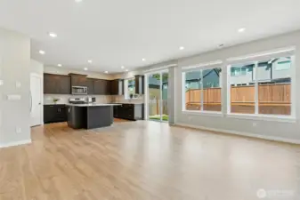 Open concept seamlessly allows for flow between the kitchen and living spaces.