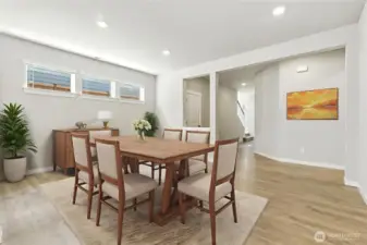 The dining area is the heart of the home and the perfect place to entertain guests. This room is virtually staged.