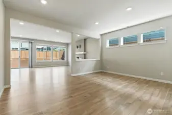 Open dining, living and kitchen spaces makes entertaining a breeze.