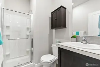 Main level 3/4 bath serves main living space and main floor bedroom.