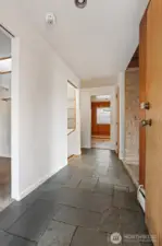 Front entry way, featuring a slate tile floor.