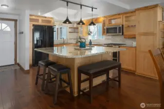 Big kitchen with large Island, pantry, and ample counter space for all your cooking needs.