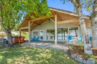 Beautiful covered back patio to relax and enjoy the views, sunsets and nature at its best.  Ample room for relaxing, entertaining, BBQ or whatever!!