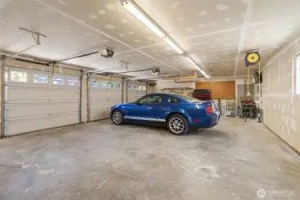 Large garage with extra side space.