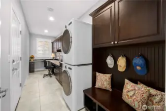 The Smart Space offers a work/craft space, additional storage, a convenient bench, laundry and a deep laundry sink.