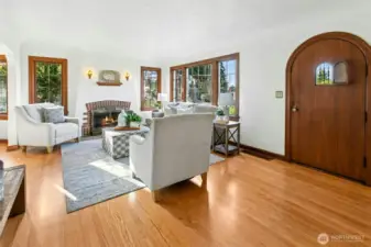 Gorgeous hardwood floors and oh so cool speakeasy front door.