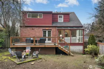 Large deck with stairs down to fully fenced backyard is fantastic for gatherings large or small.