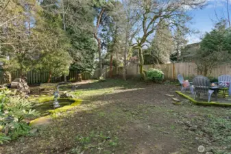 Enjoy the sounds of birds chirping and the beauty of magnolia and dogwood trees blooming your own in-city oasis.