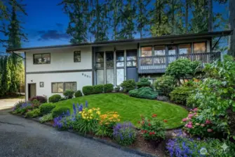 Adorable Mid-Century Modern Home on your own quiet, private Oasis! AI enhanced landscaping.