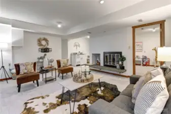 Lower level family room w/ fireplace OR 1 bedroom apartment w/ Kitchen!