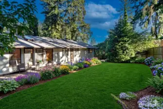 Flat, level, private gardened lot w/ slope on NE corner of Driveway - see topo map.