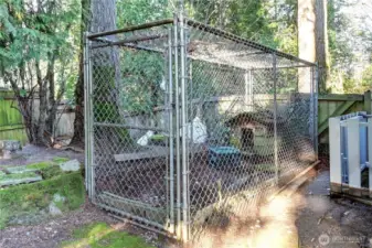 Fully fenced rear yard with dedicated canine area.
