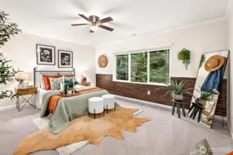 Relaxing primary bedroom with five-piece ensuite bath  and a large walk-in closet with custom built-in storage