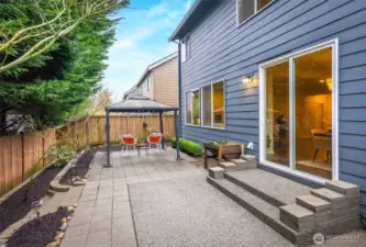 Easy to maintain backyard with gazebo that is fully fenced