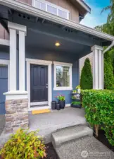 Covered porch at the entrance of the home