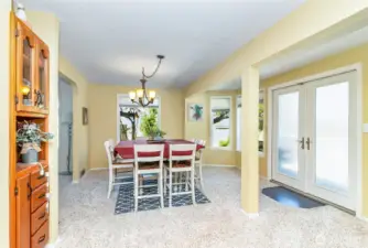 Looking from the Kitchen to the Dining Room~Built in Oak Hutch~Coffee Bar~Liquor Closet~Curio Catch All~