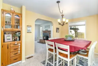 Close up of the Dining Looking to the Formal Living~All Main Floor Rooms Easily Flow from one to Another~Clear Site Lines for Toddlers & Pets~