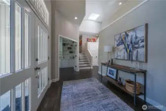 Dramatic entry with second story overlook.  The French doors to the left of the stairs lead to the main floor den/office with plenty of built-ins.  Xfinity currently supplies the cable and internet, but Ziply has laid their fiber in the neighborhood...and will be coming soon!