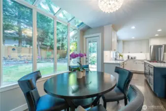 Another view of the kitchen eating space...with a nice view of the amazing backyard.