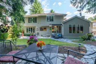 Tranquil back yard with room to play, entertain, or just relax.