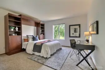 One of the 2 additional bedrooms features a Murphy bed system that stays!