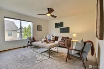 The 2nd bedroom overlooks the backyard