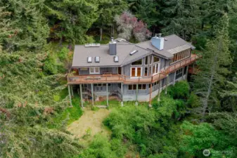 The home offers privacy from neighbors, situated amongst beautiful forest trees. Low maintenance grounds
