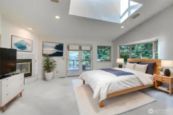 The primary bedroom has double doors to the west facing deck plus a fireplace for cool evenings