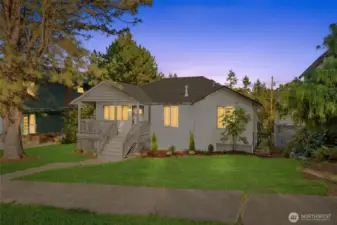 Stylishly renovated rambler with daylight-basement and oversized 672 sf garage nestled on a double lot!