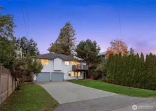 6,098 sq ft lot offers excellent DADU potential with 50-ft alley access and ample parking – bring your RVs & toys.