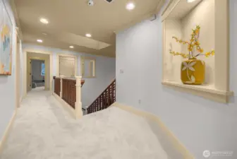 Upper level skylights and high ceilings; alcove spolights