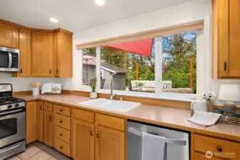 Big and bright window looks out to the composite deck and back yard.