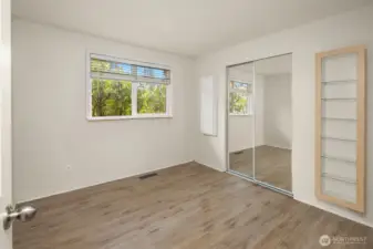 Bedroom #2 looks out to the front yard.