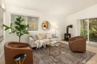 House #2: A brand new freestanding gas stove adds to the cozy feel in this sweet house. Sliding doors lead to small private patio out back.