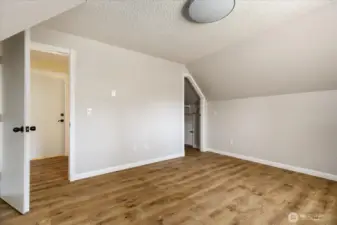 Long closet on right. Door to primary can be seen through doorway.