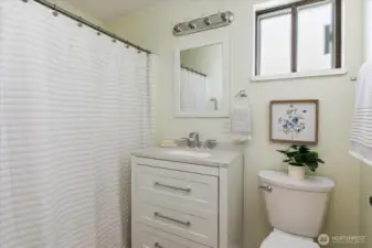 Full bath at top of stairs for bedroom 2's use.