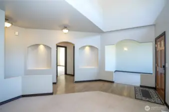 Bright, open entry with the living area conveniently located just off the right of the front door.