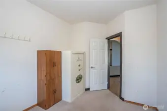 Additional view of the den/office showcasing its flexible and functional layout.