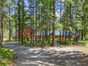 Front entry nestled in the trees