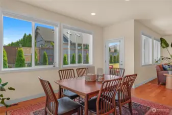 Dining room opens to the partially covered patio and back yard.