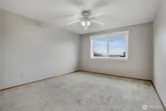 Another view of the primary bedroom