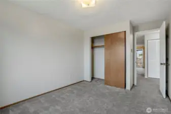 This second bedroom is a cozy and comfortable space that can be used as an office as well.
